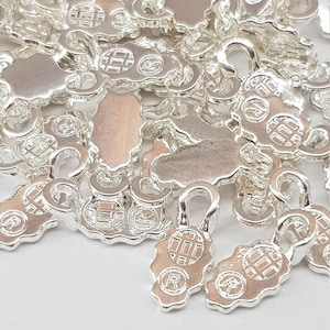 Brincos com cola banhada a prata: 50 pequenos pingentes DIY