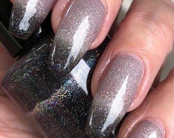 Left to Right - black thermal nail polish with scatter holo glitter