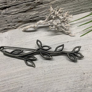 Poncho pin brooch metal blackened leaf tendril filigree branch metal with leaves kilt pin as a jacket fastener cloth clasp pin