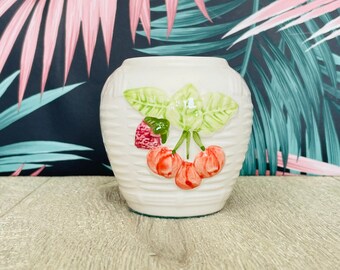 Small  white ceramic vase with cherry patten