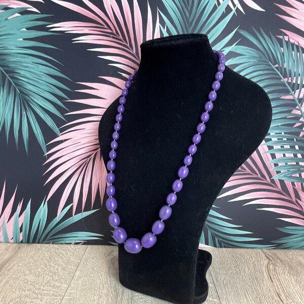 Oval graduated purple beads -  vintage matinee length plastic beaded necklace for women