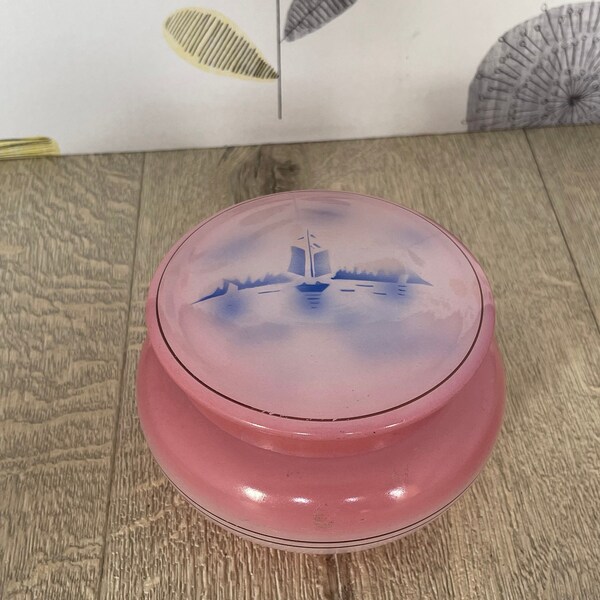 Pink glass powder or trinket pot but blue sail boat design to the lid - Art deco era glassware