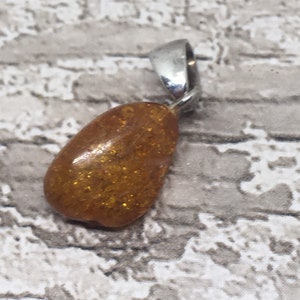 Vintage cloudy amber and sterling silver  teardrop pendant