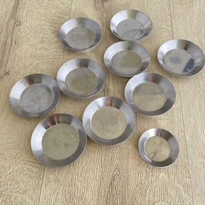 Set of ten individual tart tins or canapé moulds