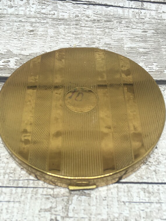 Loose sale powder compact
