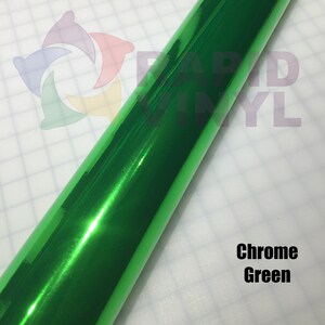 May include: A roll of bright green chrome vinyl wrap. The vinyl has a reflective, metallic finish.