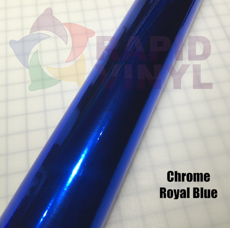 May include: A roll of chrome royal blue vinyl wrap. The vinyl has a shiny, metallic finish.