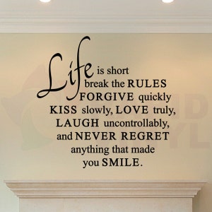 Life Is Short Love Quote Wall Decal. Forgive, Kiss, Love, Laugh, Smile Wall Art - Removable. Great for around a photos, a clock, and more!