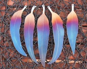 Stainless steel rainbow coloured decorative eucalypt leaf set