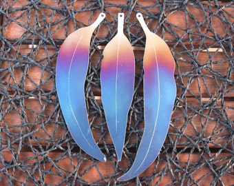 Stainless steel rainbow coloured decorative eucalypt leaf 3 piece set