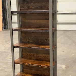 May include: A rustic wooden sign with the text "Welcome to our home" in a handwritten style. The sign features a distressed finish and a simple, inviting design, perfect for a front porch or entryway.