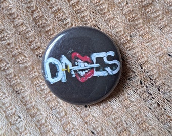 Button, The Dames, punk