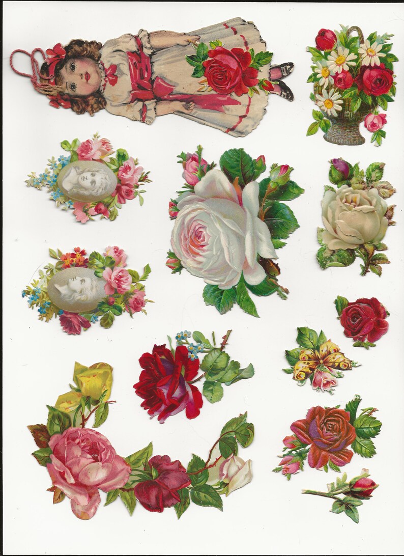 May include: Vintage paper ephemera with images of roses, a girl doll, and a basket of flowers. The images are printed on white paper and have a faded, antique look.