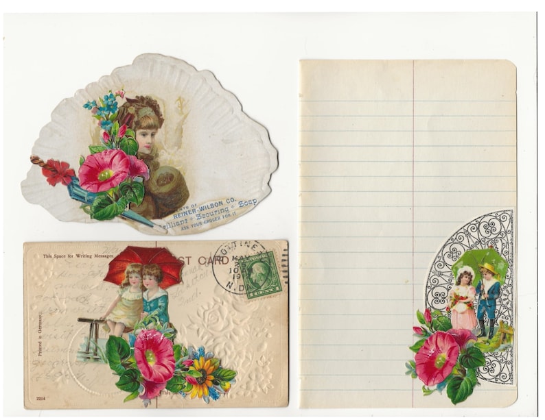 Op de afbeelding: Een vintage ansichtkaart met een rode paraplu en twee kinderen eronder. De ansichtkaart heeft een bloemmotief met roze en gele bloemen. De ansichtkaart heeft een postzegel van 10 mei 1917.