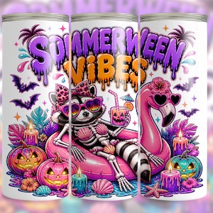 May include: White tumbler with a colorful "Summerween Vibes" design. Features a raccoon skeleton in sunglasses, a flamingo with heart-shaped sunglasses, pumpkins, bats, and candles. The tumbler has a spooky, tropical theme.