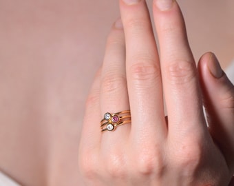 Gold ring set with natural stones for women