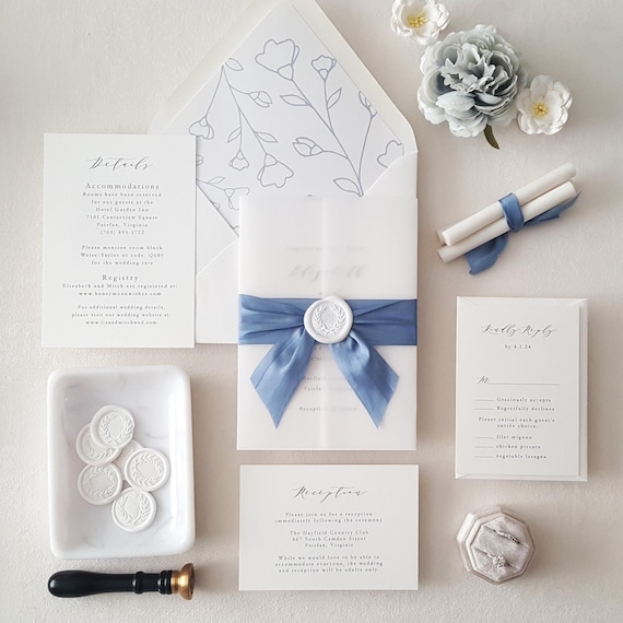 ribbon tied wedding invitations