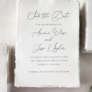 Custom save the date printed on handmade cotton rag deckle edge paper with elegant black calligraphy, showing the natural paper texture and torn edges.