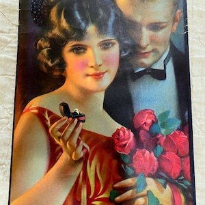 May include: Vintage illustration of a couple. The woman holds a ring box with a diamond ring. The man, in a tuxedo, holds a bouquet of red roses. The woman wears a red dress.