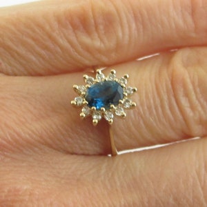 14k Yellow Gold Diamond And Blue Topaz Ring