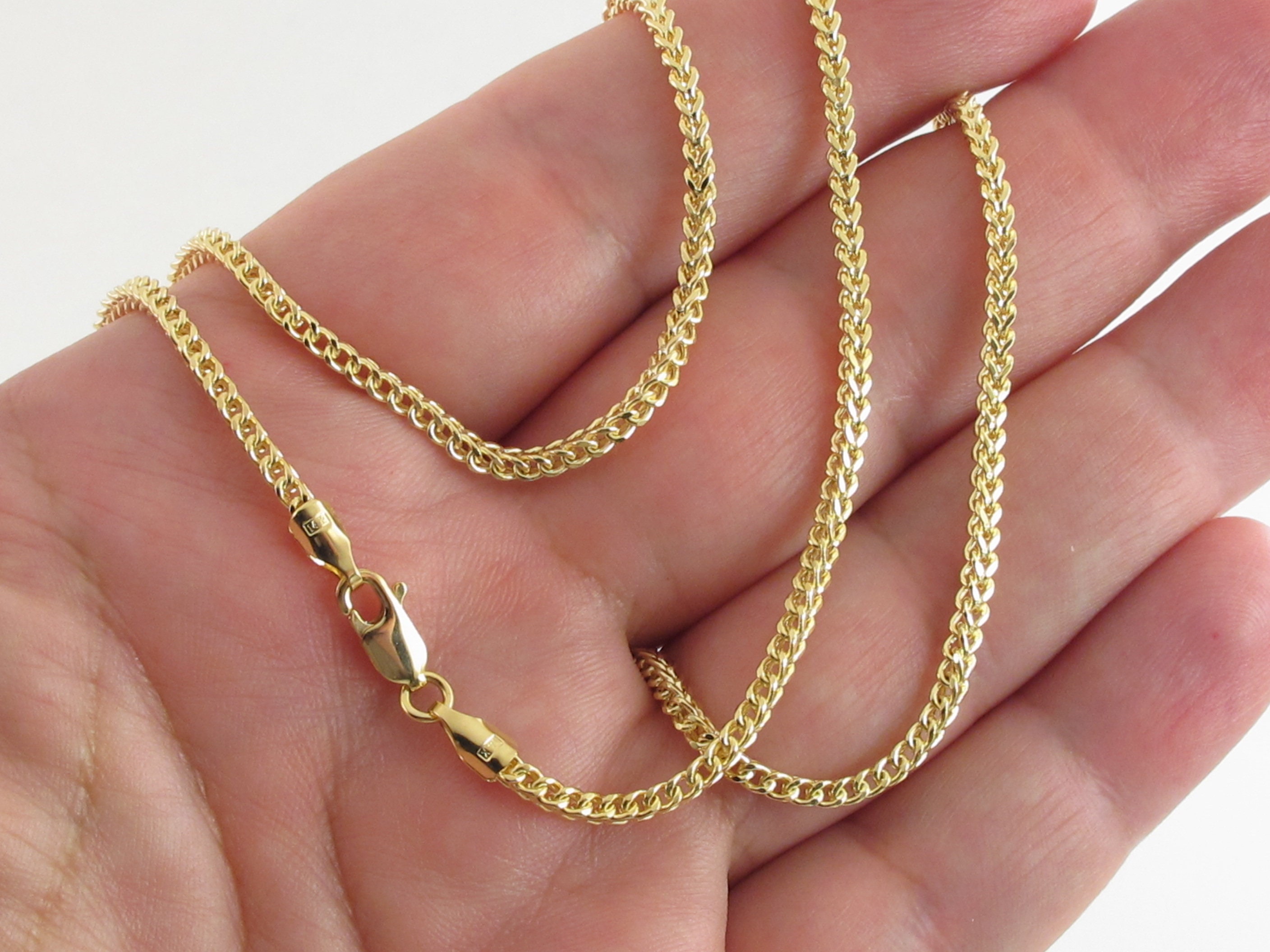 0.7mm Solid 14k Yellow Gold Polished Twisted Sideways Cross 17 inch Necklace Chain