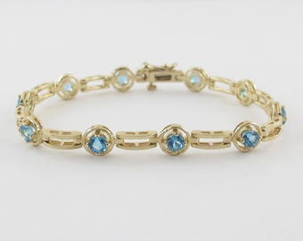 14k Yellow Gold Gemstone Blue Topaz Tennis Bracelet 6 7/8"
