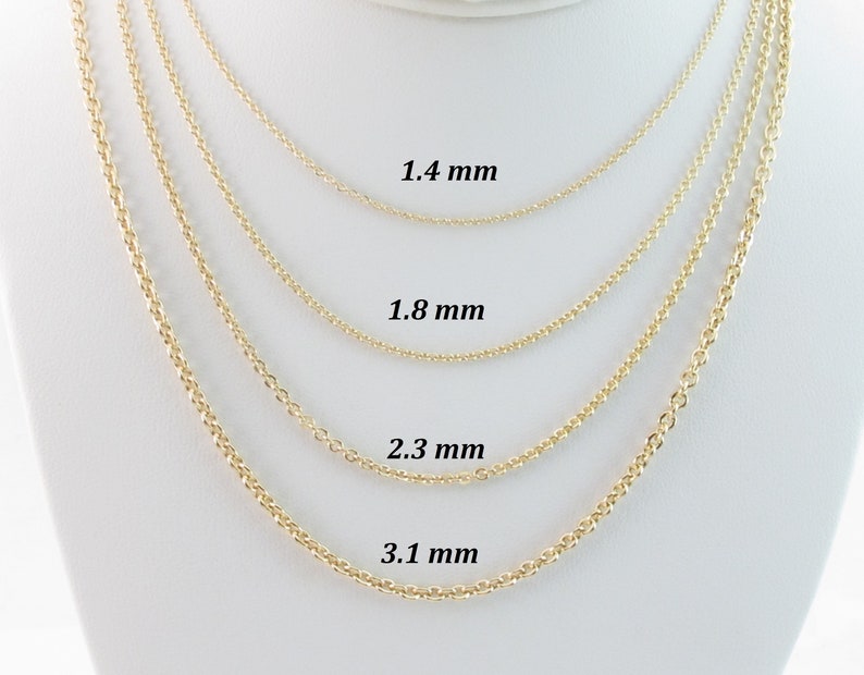 May include: Four gold-colored chain necklaces of varying thicknesses are displayed against a white background. The chains are labeled with their widths: 1.4 mm, 1.8 mm, 2.3 mm, and 3.1 mm. The chains are likely for jewelry making or wearing.