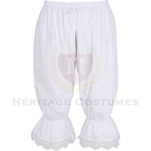 May include: White cotton bloomers with lace trim. The bloomers have a gathered elastic waistband and are cropped at the knee.