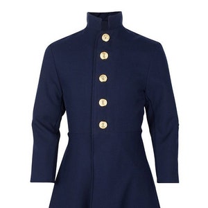 May include: A navy blue frock coat with a high collar and gold buttons. The coat has a fitted bodice and a flared skirt.