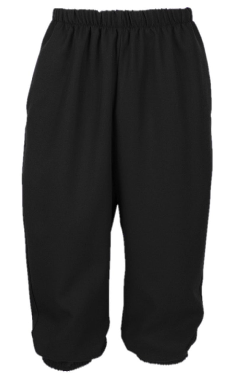 May include: Black, knee-length pants with an elastic waistband. The pants have a loose fit and are made of a solid, opaque fabric. The design is simple and classic, suitable for various activities.