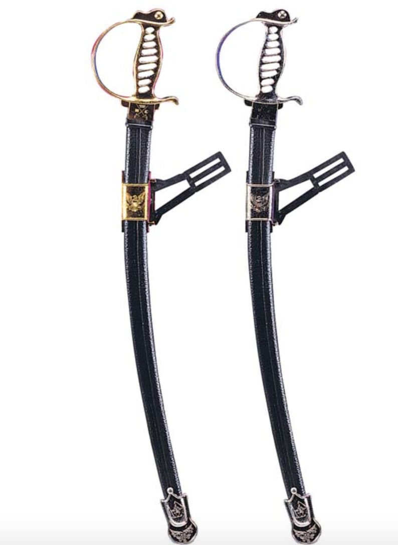 May include: Two ceremonial swords with black scabbards and ornate metal hilts. One sword features a gold-toned hilt and scabbard fitting, while the other has a silver-toned finish. Both scabbards include a black mounting bracket and metal tip.