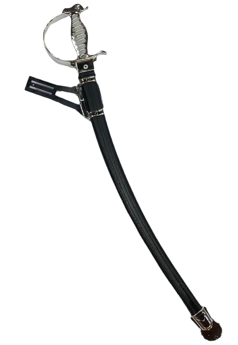 May include: A ceremonial sword with a curved blade housed in a black scabbard. The hilt features a polished silver-tone metal guard and a ribbed grip. A black attachment piece is fixed to the upper section of the scabbard, which also includes silver-tone metal accents at the throat and the chape at the bottom tip.