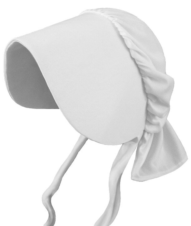 May include: A solid white bonnet featuring a wide, stiffened front brim and a gathered crown section. The headwear includes two long, matching white fabric ties hanging from the sides, designed to secure the bonnet under the chin.