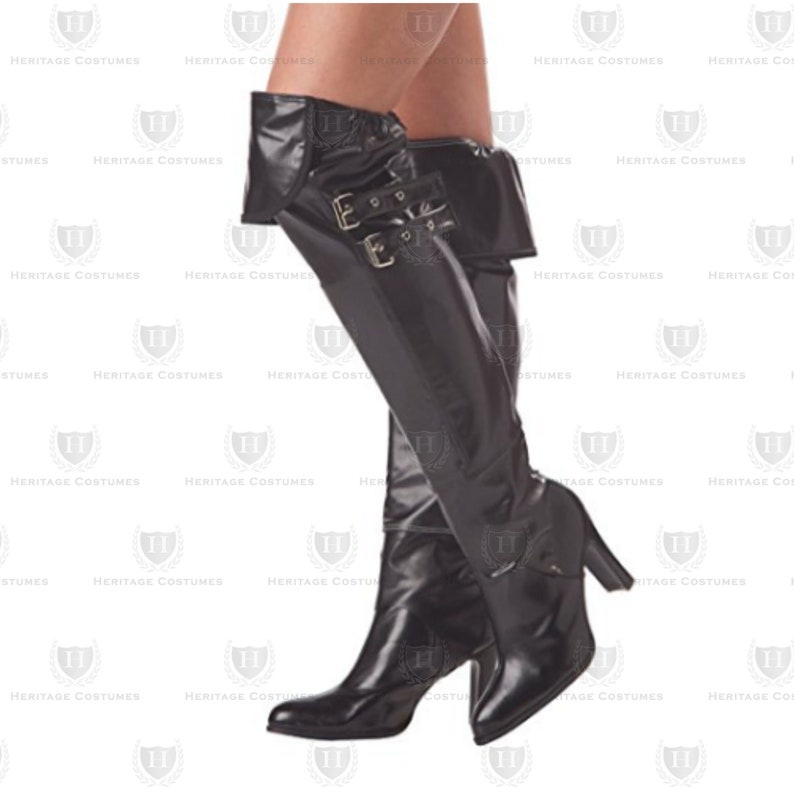 May include: Black over-the-knee boots with a high heel and buckle details. The boots have a folded-over top and are made of a shiny material. The boots are part of a costume.