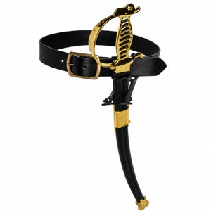 May include: A black belt featuring a gold-colored buckle, paired with a sword scabbard that has a gold-colored hilt and matching gold-colored accents. The scabbard is attached to the belt, creating a cohesive set with a metallic gold finish.