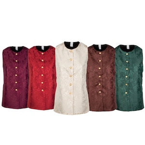 May include: Five sleeveless vests in various colors: burgundy, red, cream, brown, and green. Each vest features a floral pattern, a black collar, and gold-colored buttons down the front. The vests are displayed against a white background.