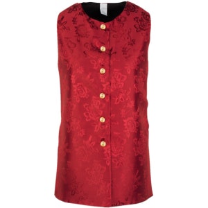 May include: A sleeveless vest in a deep red fabric featuring a tonal floral jacquard pattern. The garment has a round neckline, a black interior lining, and a front closure secured by five round, polished gold-toned buttons arranged vertically.