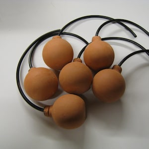 Olla Ball Irrigation System.  Save water, time and money on your back yard garden.