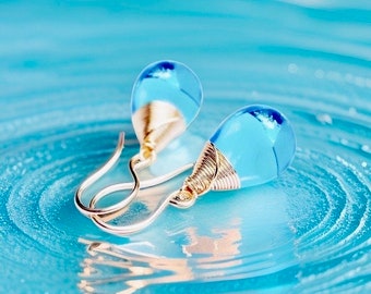 Gorgeous recycled blue glass drop earrings! Ocean inspired eco friendly wrapped in quality gold or silver wire handmade in hawaii with love!
