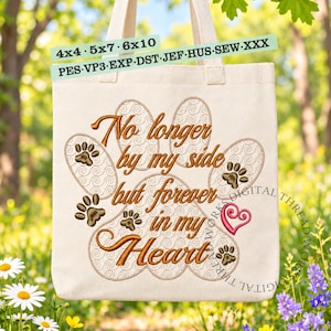 May include: A beige canvas tote bag featuring an embroidered design of a large paw print with the text No longer by my side but forever in my Heart. The design includes small paw prints and a pink heart. Text at the top reads 4x4, 5x7, 6x10, PES, VP3, EXP, DST, JEF, HUS, SEW, XXX.