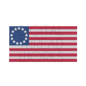 May include: A red, white, and blue embroidered flag with 13 stripes and a blue canton featuring 13 white stars in a circle.