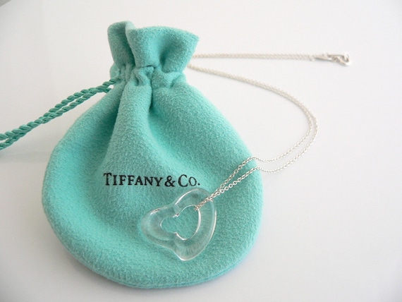 Elsa Peretti® Open Heart Pendant in Sterling Silver, 7 mm | Tiffany & Co.