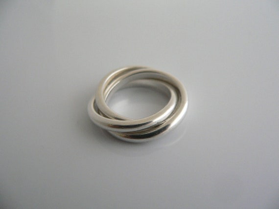 Tiffany And Co Silver Triple Rolling Interlocking… - image 1