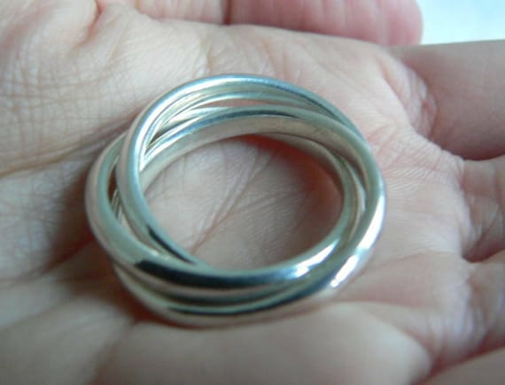 Tiffany And Co Silver Triple Rolling Interlocking… - image 2