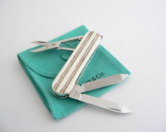 Tiffany & Co Sterling Silver Atlas Stripe Swiss Knife Gift Pouch Love T Co Tiff and Co Army Knife Scissors Nail FIle