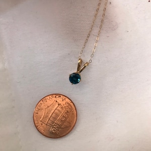 14kt yellow gold pendant necklace with London Blue Topaz