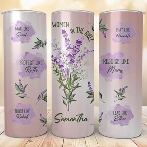 May include: Three pink stainless steel tumblers with floral designs and inspirational quotes about women in the Bible. The tumblers feature the names Sarah, Ruth, Rahab, Hannah, Mary, and Esther. The middle tumbler has the text "Women in the Bible" and the name "Samantha".
