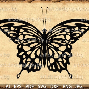 Puede incluir: Silueta negra de una mariposa con intrincados patrones de alas sobre un fondo marrón.