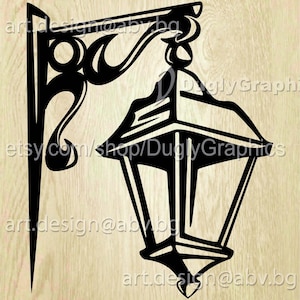 May include: A black wall-mounted lantern graphic featuring a decorative scrollwork bracket and a multi-paneled lamp housing. The design includes the text art.design@abv.bg, DuglyGraphics, and etsy.com/shop/DuglyGraphics, with file formats listed below.