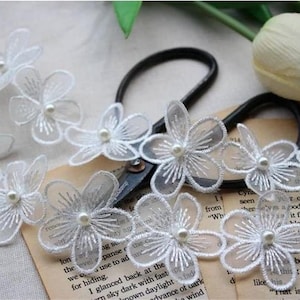 Delicate lace with white beaded floral lace appliqué for a , lingerie and necklace fashion design